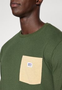 Patagonia Långärmad tröja - green