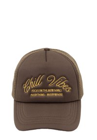 Brown cap with mesh sides, featuring golden embroidered text "Chill Vibes" and smaller text below. Curved bill with visible stitching.