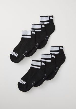 Calcetines tobilleros negros con puños a rayas blancas, con un logo y una marca de talla. Textura suave y diseño ajustado para mayor comodidad. Conjunto de seis pares.