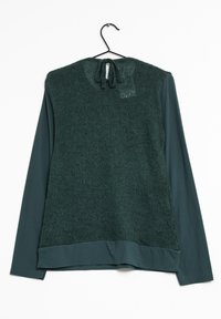Groene lange mouw top met een textuur gebreide achterkant, een gladde voorkant en een geknoopte sluiting bij de nek. Zachte stof met een relaxte pasvorm.
