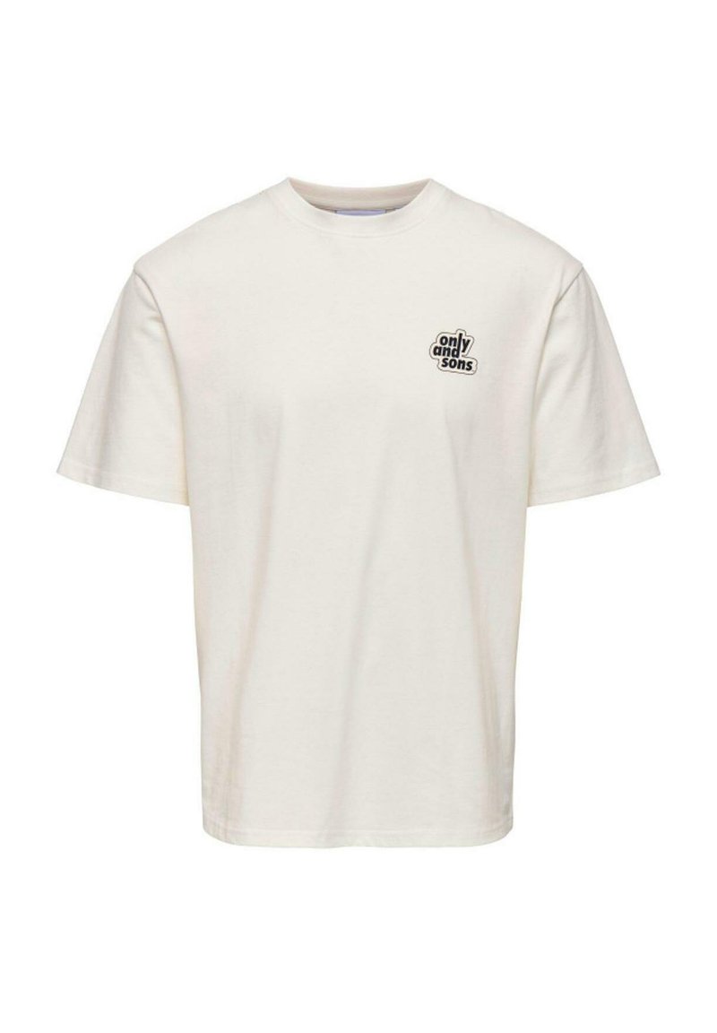 T-shirt à manches courtes en coton crème avec un col rond et un petit patch logo noir sur la poitrine gauche. Design simple, sans motifs.
