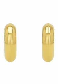 Pendientes de metal dorado con una superficie lisa y pulida. Diseño redondeado y forma ligeramente alargada. Sin cierres visibles ni adornos.