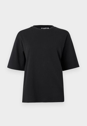 Tricou negru supradimensionat cu mânecă scurtă și decolteu rotund, afișat pe un fundal simplu gri deschis.