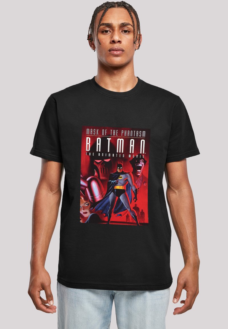 Svart T-skjorte med en fargerik grafisk utskrift av Batman fra "Mask of the Phantasm," med en dristig tittel og karakterdetaljer.