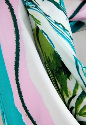 Silk scarf featuring a pattern of green leaves on a light background with pastel blue and pink stripes. Smooth texture and flowing design.