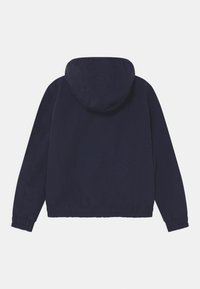 Marineblå hættejakke med lange ærmer, elastiske manchetter og kant, vist bagfra på en ensfarvet hvid baggrund.