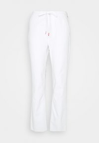 Witte joggingsbroek van zacht stof, met een verstelbare tailleband, zijzakken en een recht gesneden ontwerp. Geen zichtbare patronen of accenten.