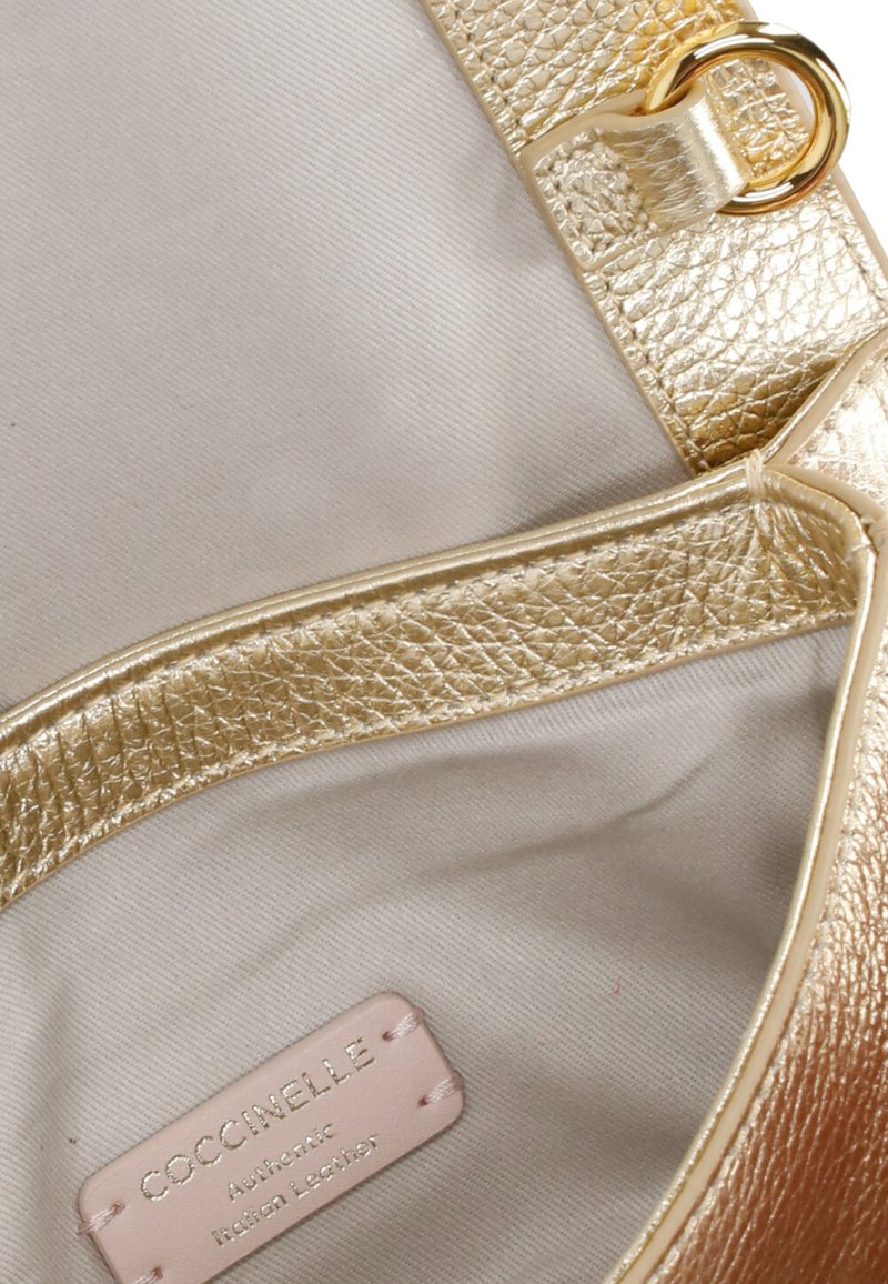Coccinelle Grained Leather Minibag Aura Smooth in Natural | Lyst