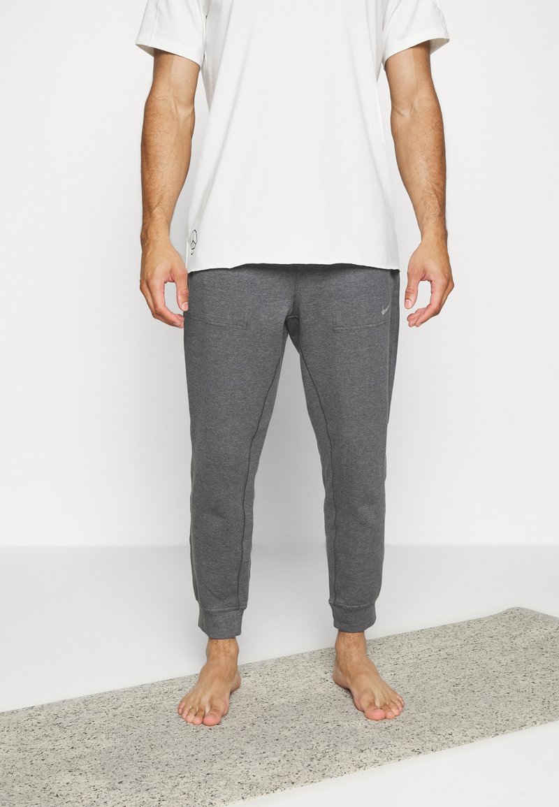 Nike Performance PANT RESTORE Tracksuit bottoms black/pure/multi