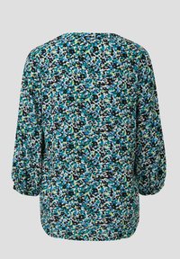 Bluse mit floralem Muster in Blau-, Grün- und Schwarztönen aus leichtem Stoff. Runder Ausschnitt und dreiviertellange Puffärmel. Glatte Textur.