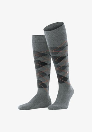 Szare skarpetki za kolano z wzorem w diamenty w ciemnoszarym i czarnym kolorze, z pomarańczowymi akcentami oraz teksturowanym ściągaczem u góry.