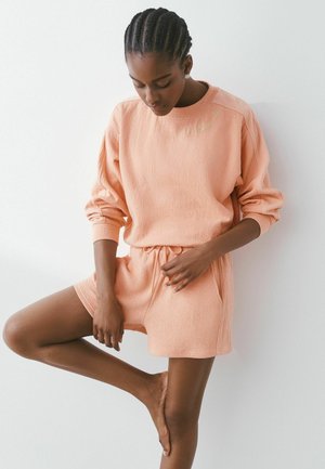Next, REGULAR FIT - TEXTURED SHORTS . - Jogginghose - coral pink