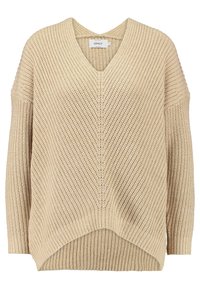 Beige pletený svetr s véčkovým výstřihem, volným střihem, spuštěnými rameny a žebrovanou textrou. Spodek je vzadu delší, což ukazuje na lehký design.