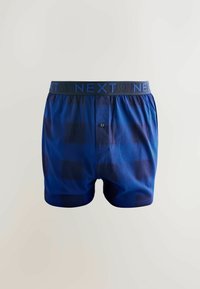 Granatowe bokserki w kratkę w różnych odcieniach niebieskiego. Elastyczny pas z nazwą marki "NEXT" w kolorze niebieskim. Zapięcie na jeden guzik.