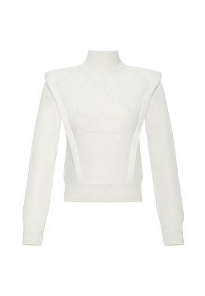 Pull en maille blanche avec un col montant, des épaules structurées et un logo en forme de pique au centre. Il possède de longues manches et un ourlet ajusté.