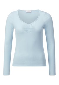 Jasnoniebieska bluzka z długim rękawem, dekoltem w serek i marszczeniem na środku. Wykonana z miękkiego, gładkiego materiału o dopasowanym kroju.