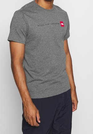 Gray short-sleeve t-shirt made of cotton blend, featuring "NEVER STOP EXPLORING" text in black and a small red logo detail on the chest.