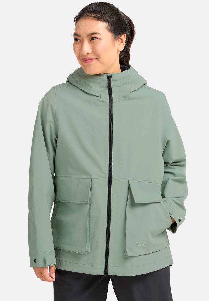 Hellgrüne wasserdichte Jacke mit Kapuze, zwei großen Fronttaschen, Reißverschluss und verstellbaren Manschetten. Robustes Material.