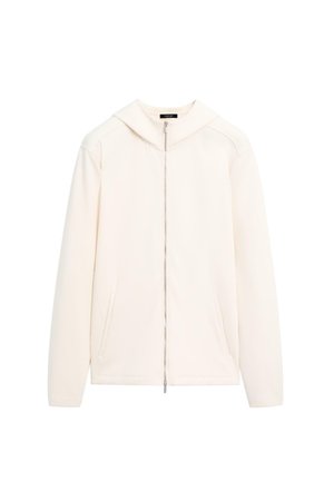 Off-white lynlåsjakke med hætte, lange ærmer og to forlommer, vist på en enkel hvid baggrund.