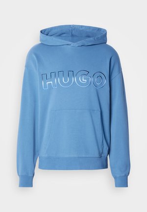 Blue hooded sweatshirt with a front pocket and the word "HUGO" in embossed, glossy letters across the chest. Made of soft fabric.