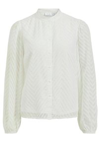 Valkoinen pitkähihaista paitapuseroa, jossa on nappikiinnitys, kalastajakuosiset tekstuuri ja mandariinikaulus. Puffihihat päättyvät kuminauhakuffeihin. Kevyt materiaali.