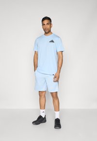 adidas Performance Športové šortky - glow blue/black