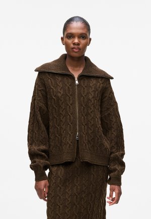 Brown cable-knit zip-up cardigan with a wide collar, long sleeves, and textured pattern, made from soft wool blend fabric.