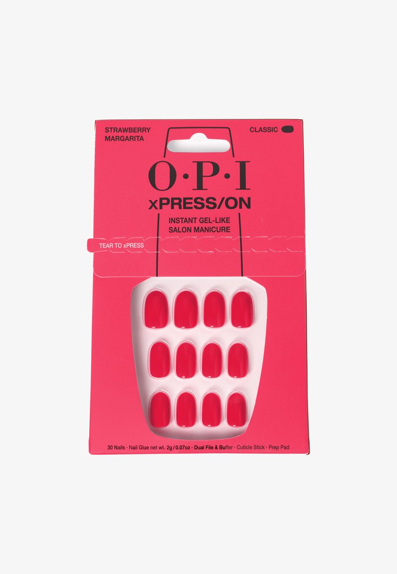 Pack OPI xPRESS/ON avec 30 faux ongles rouges en gel, base en plastique blanche, fond rose, incluant de la colle à ongles, une lime, un polisseur et un pad de préparation.
