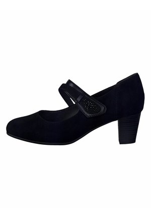 Chaussure Mary Jane en suède noir avec un petit talon, dotée d'une sangle plate et de détails découpés décoratifs sur le côté. Texture lisse, bout rond.