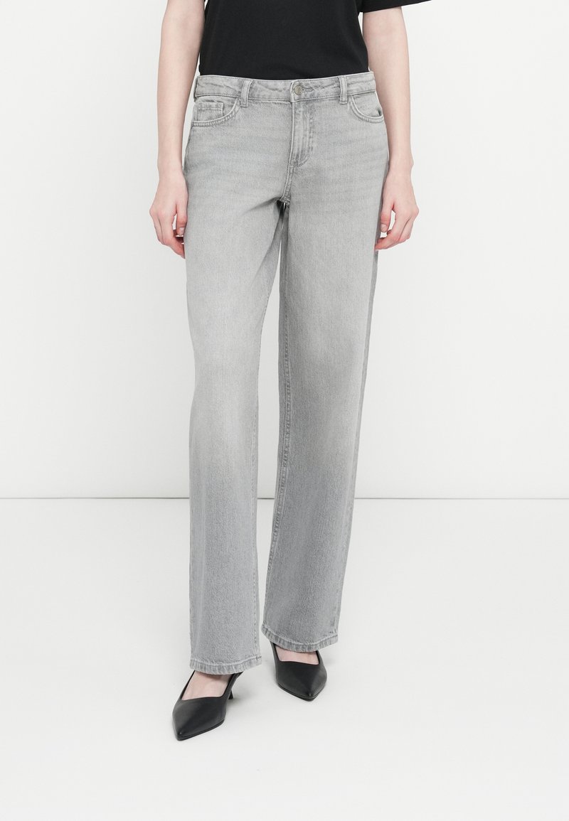 Gray denim jeans with a straight-leg design, featuring five pockets, a button and zipper closure, and a slightly faded texture.