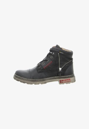 Schwarzer Leder-Stiefelette mit rundem Zehenbereich, kontrastierenden roten Nähten, seitlichem Reißverschluss und verstärkter Gummisohle. Mit einer strukturierten Oberfläche.