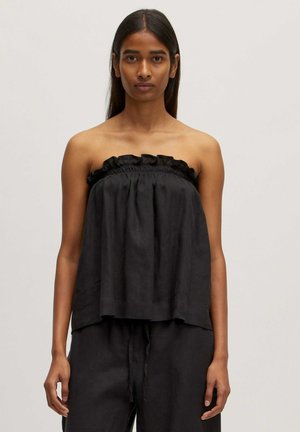 Zwarte linnen strapless top met een gegatherde halslijn en ruches aan de rand. Heeft een losse, vloeiende snit en een textuurstof.