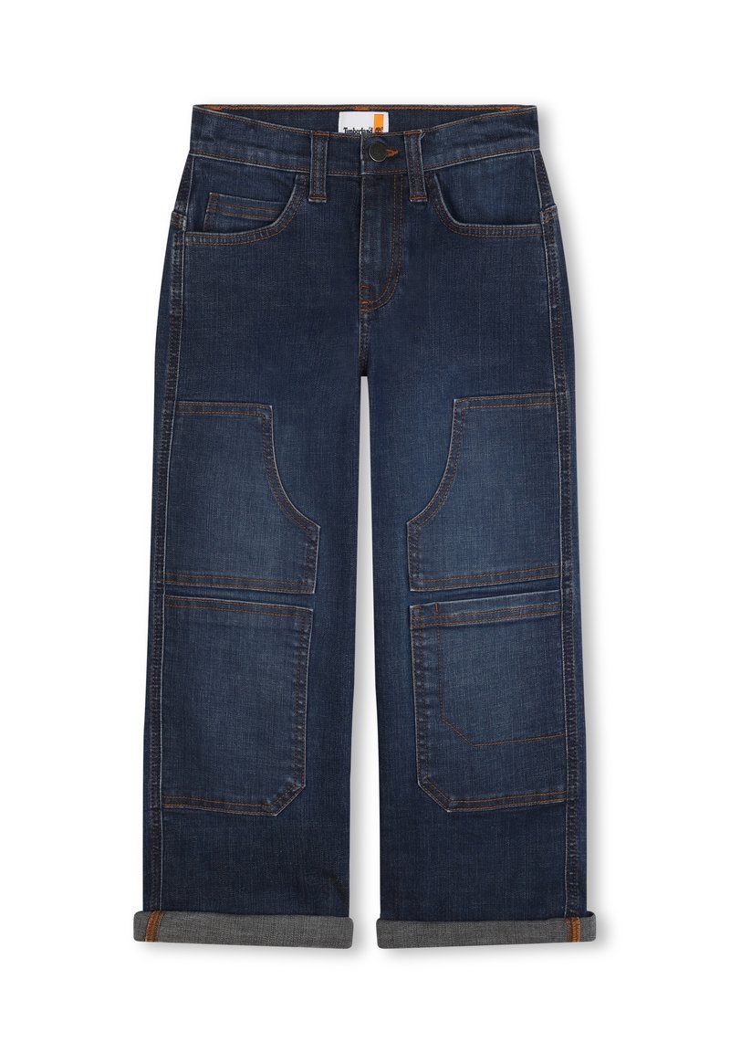 Pantalons larges en denim bleu foncé à taille haute, dotés de plusieurs poches et de poignets retroussés, mettant en valeur des coutures contrastées.