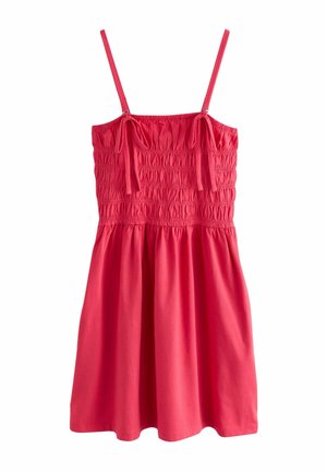 Rød ærmeløs sommerkjole med justerbare stropper, smocket krop og rynket talje, hængende mod en hvid baggrund.