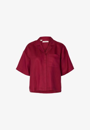 Chemise à manches courtes, boutonnée, avec col, de couleur rouge profond, dotée d'une poche poitrine avant et d'une coupe décontractée.