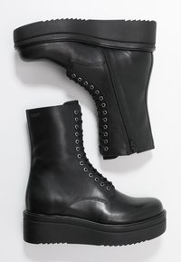 Vagabond Botines con plataforma - black