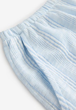 Tessuto azzurro chiaro strutturato con strisce orizzontali bianche. Presenta una vita elasticizzata arricciata. Materiale morbido e tessuto con un aspetto casual.