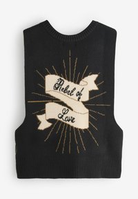 Fekete kötött ujjatlan pulóver krémszínű sávos mintával és az "A szerelem lázadója" felirattal, amelyet arany sugárnyalábok vesznek körül.