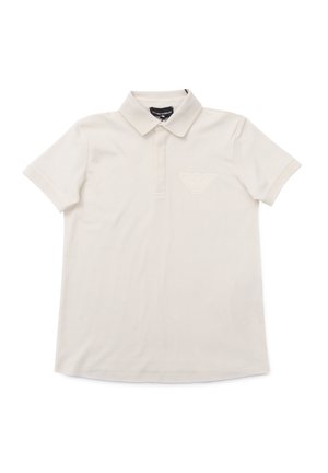 Polo shirt beige chiaro in cotone, con colletto classico, maniche corte e logo stampato sul lato sinistro del petto.