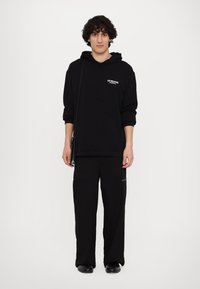Les Benjamins Sweatshirt - black