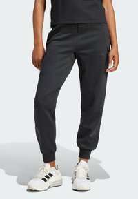 adidas Sportswear - Træningsbukser - black Miniaturebillede 1
