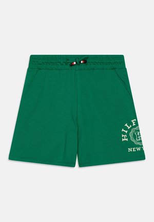 Grüne Baumwollshorts mit elastischem Bund und Kordelzug. Mit Seitentaschen und einem weißen Logo-Druck an der unteren Vorderseite.