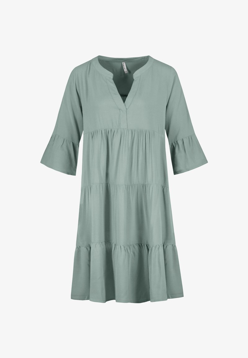 Hellgrünes Kleid, knielang, mit V-Ausschnitt, dreiviertellangen Rüschensleeves und gestuftem Rockdesign. Glattes Material mit lockerer Passform.