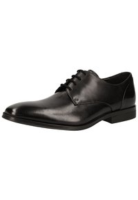 Chaussure de ville en cuir noir avec un bout pointu, finition lisse et détails cousus. Présente un design classique à lacets et un talon bas.
