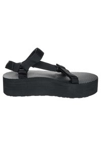 Black platform sandals featuring a textured footbed, adjustable nylon straps, and a thick, durable rubber sole. Simple design, no patterns.