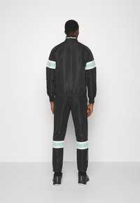 Sergio Tacchini BOARD TRACKSUIT - Melegítő - black/ocean wave
