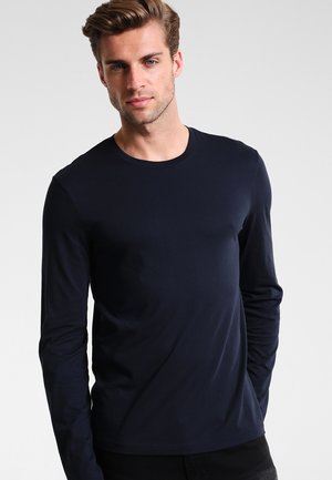 T-shirt a maniche lunghe blu navy realizzato in morbido cotone, con scollatura rotonda e design semplice, che offre una silhouette aderente.