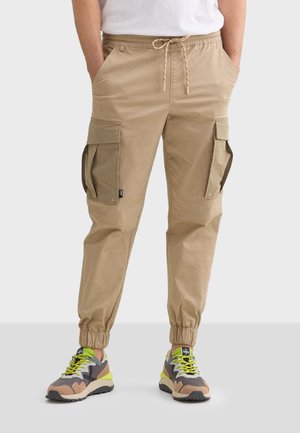 EXPLORE - Cargo trousers - beige