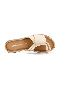 Infradito beige con una ampia fascia superiore e anello per le dita. Materiale in morbida pelle e soletta imbottita con un branding discreto.