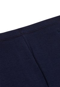 Tmavě modré legíny z bavlněné směsi s hladkou texturou, elastickým pasem a dvojitě šitými švy pro větší odolnost.